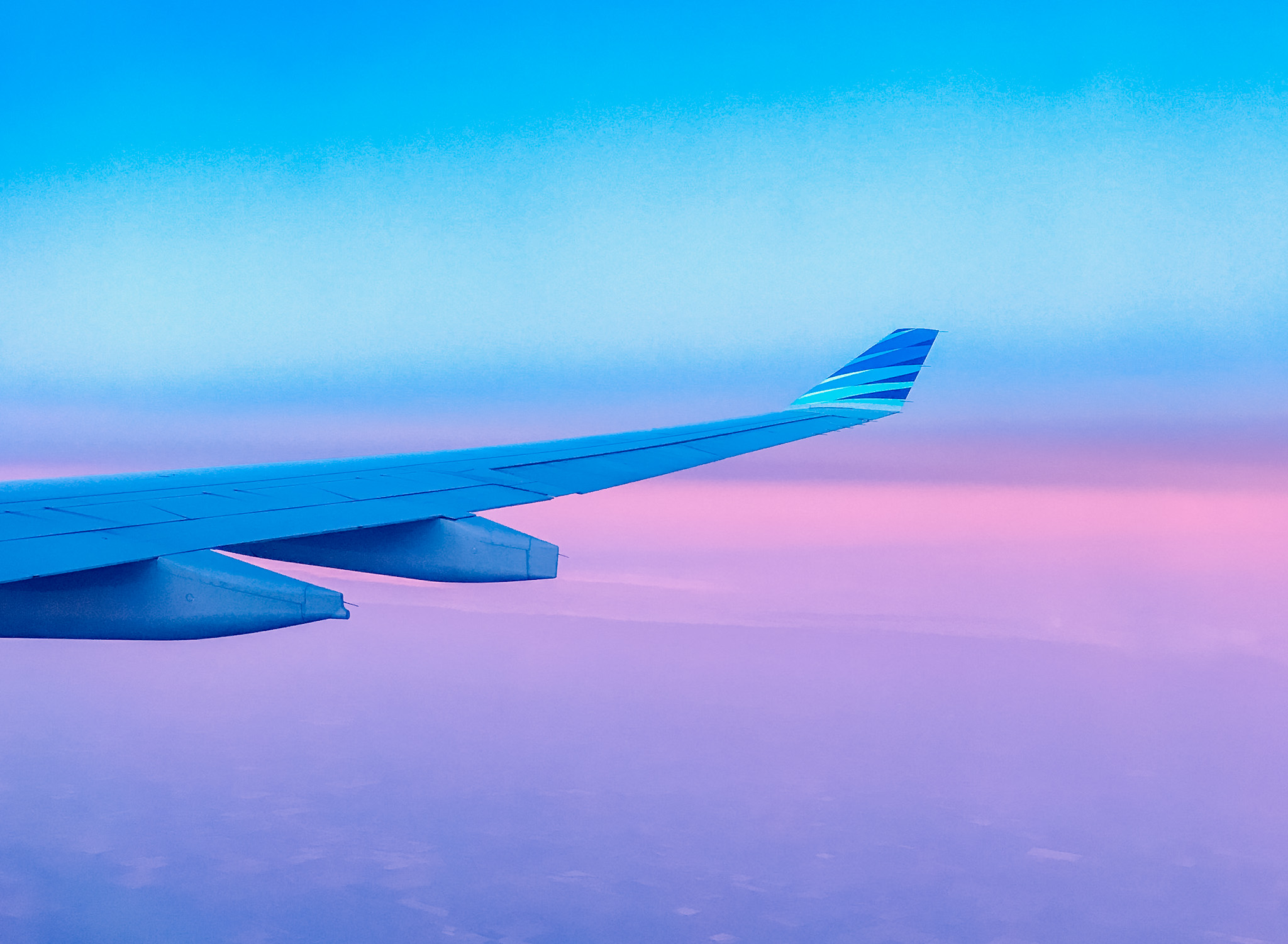 Garuda Indonesia Flight Sunrise Blue Pink